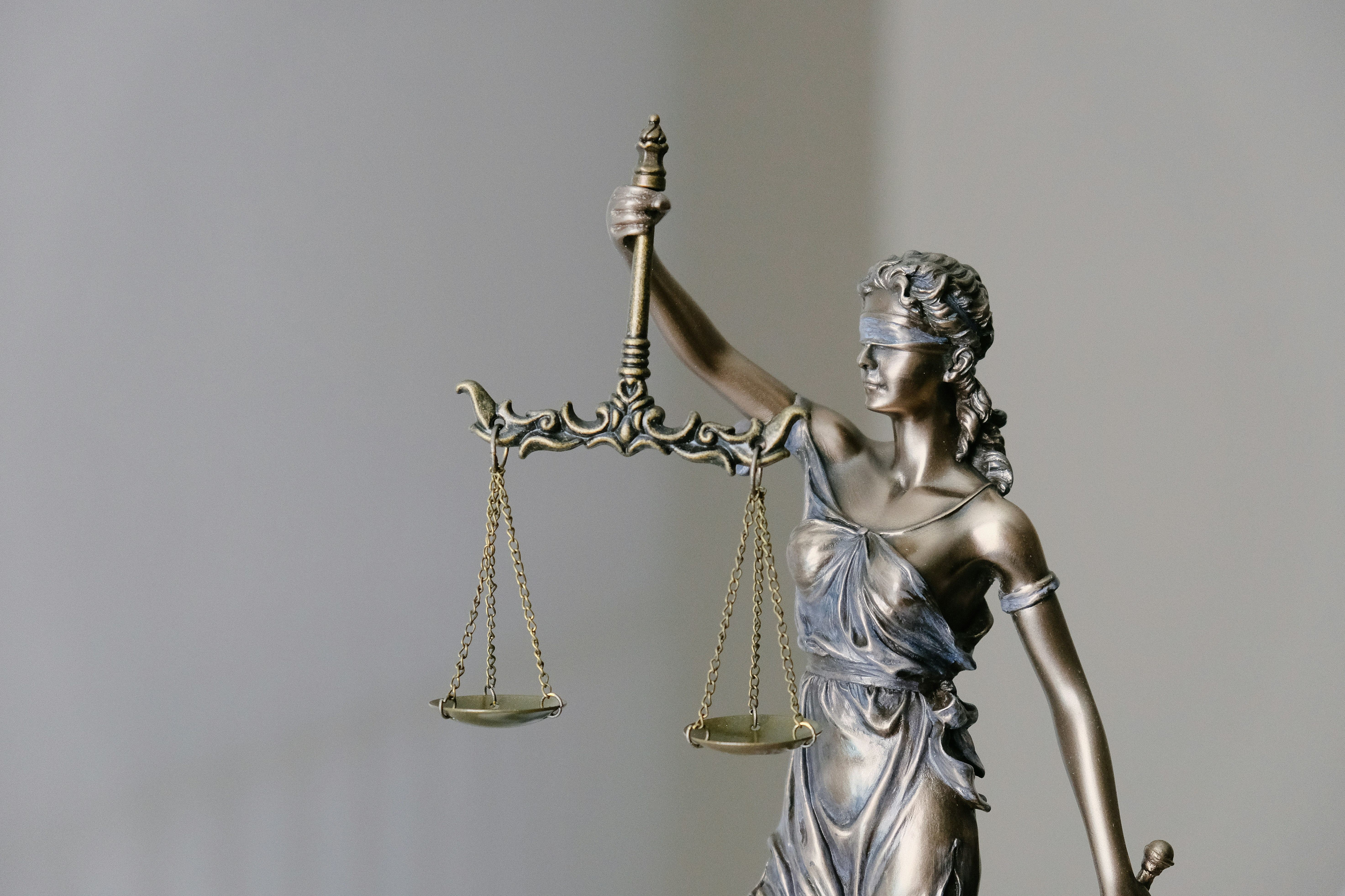 Lady Justice statue symbolizing fairness and impartiality in law